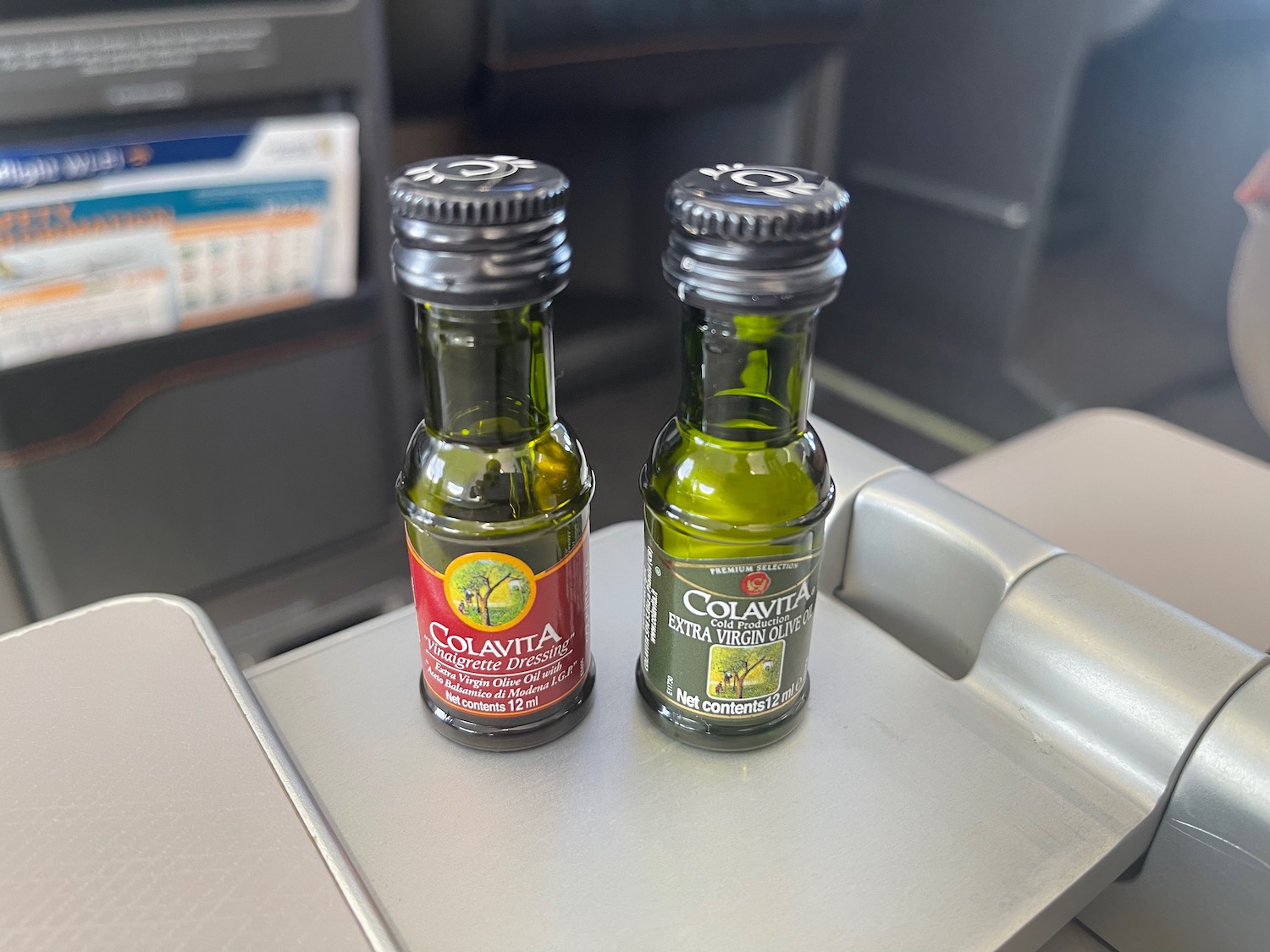 two small bottles on a tray