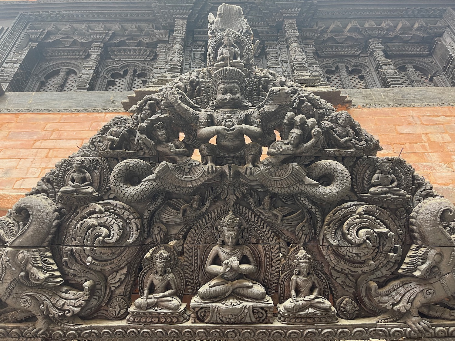 a stone carving of a man and woman