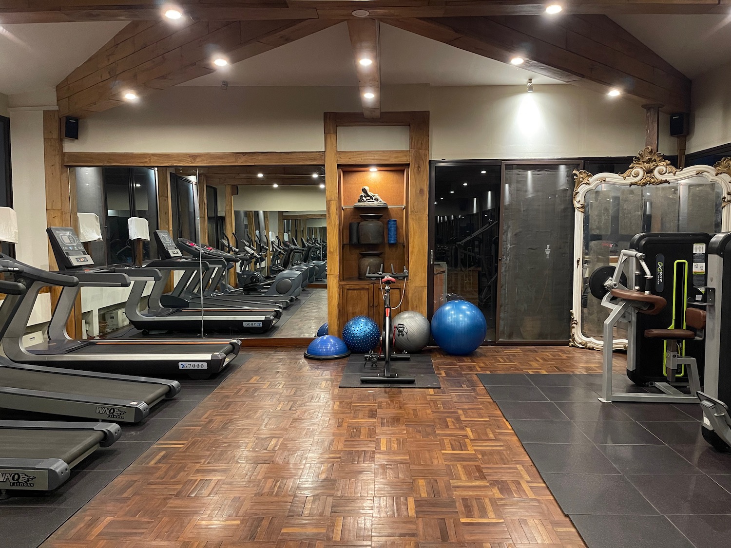 a gym with treadmills and exercise equipment