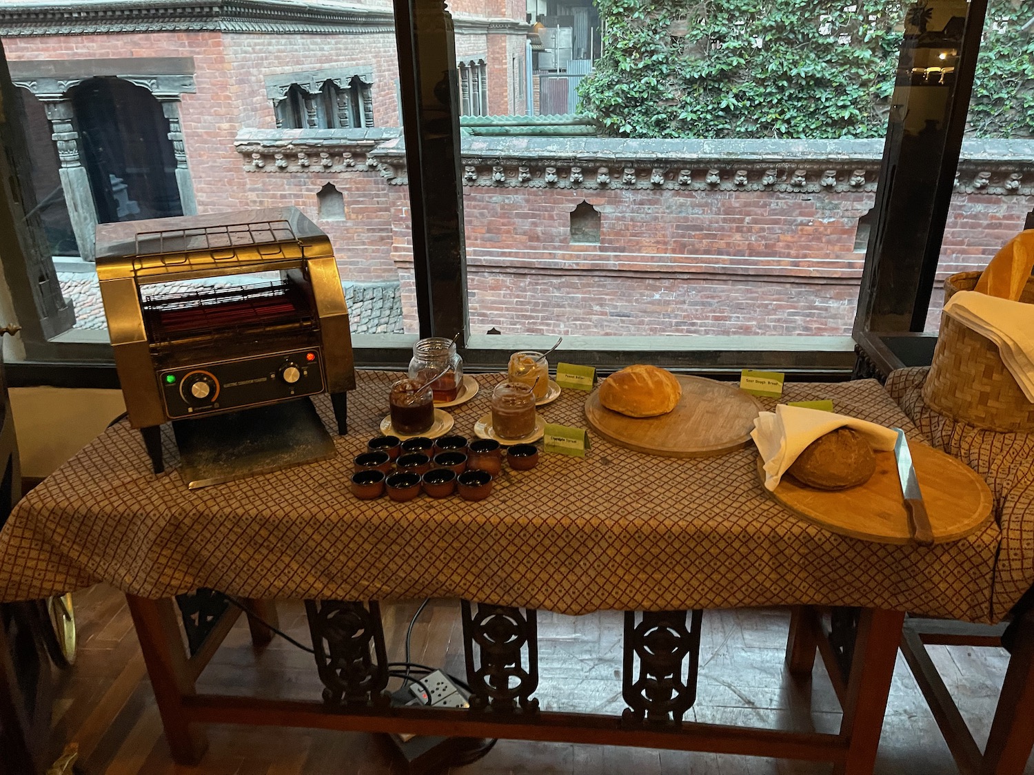 a toaster and bread on a table