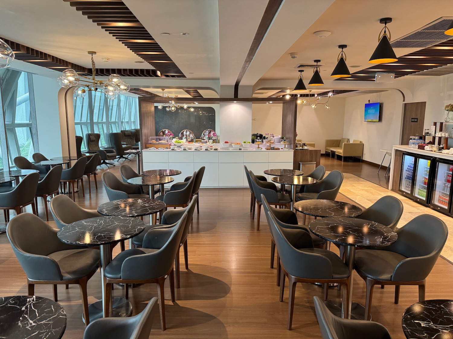 a room with tables and chairs