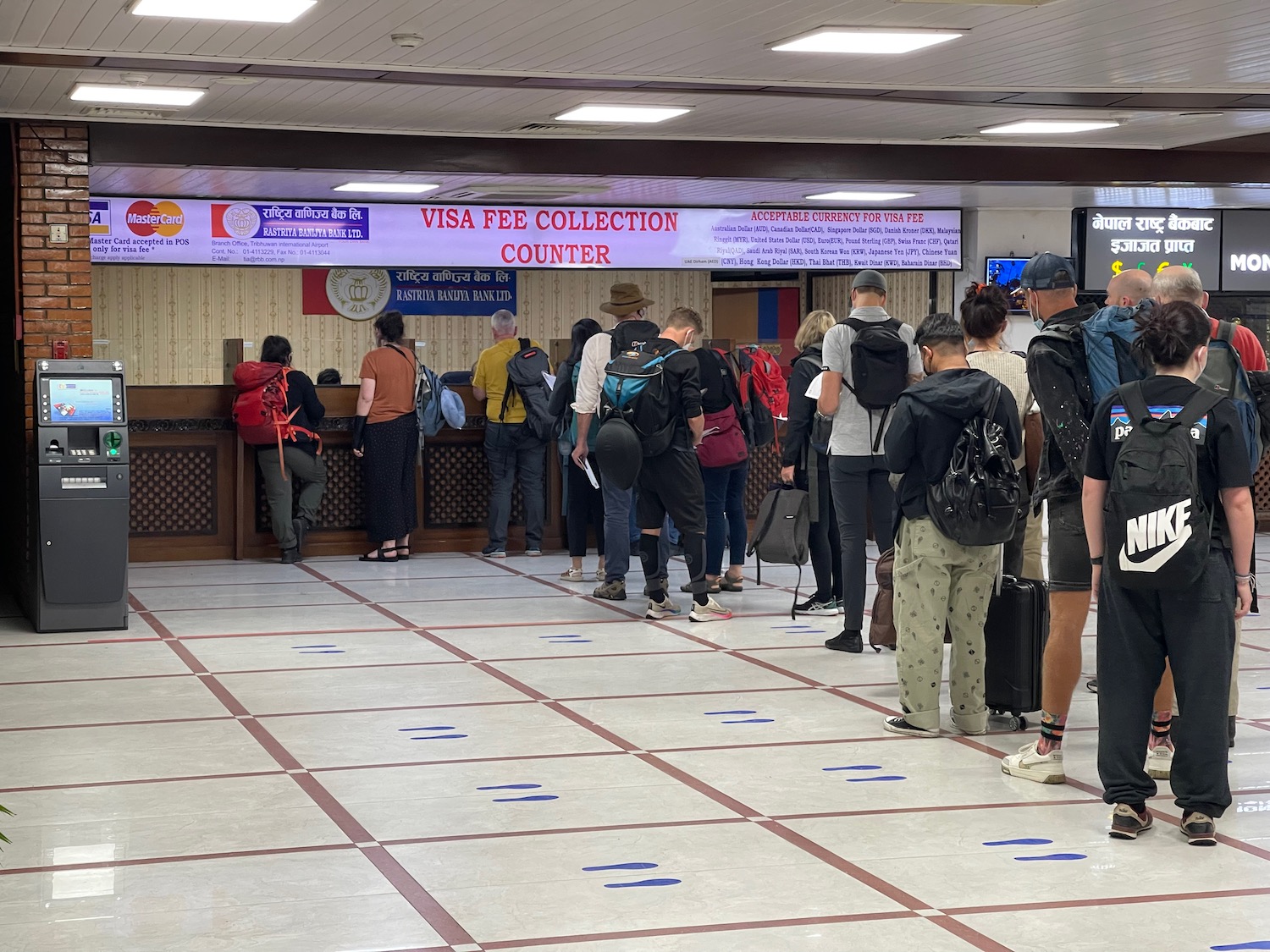 a group of people standing in a line