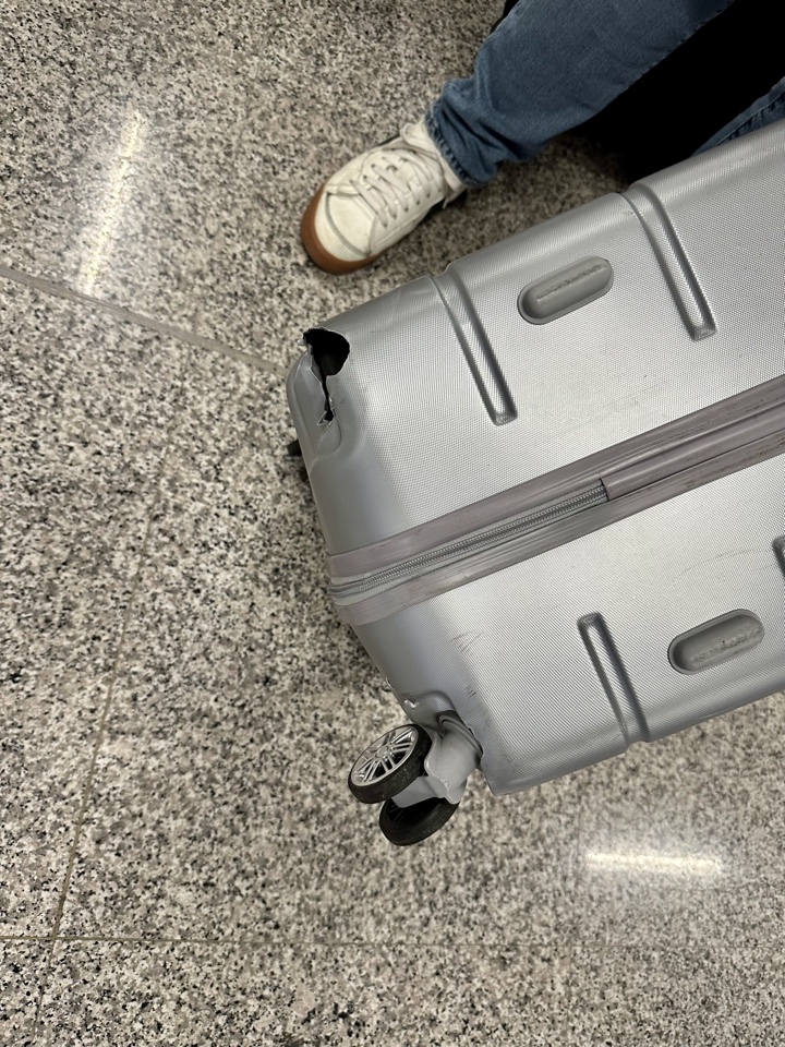 air canada business class 777 damaged luggage