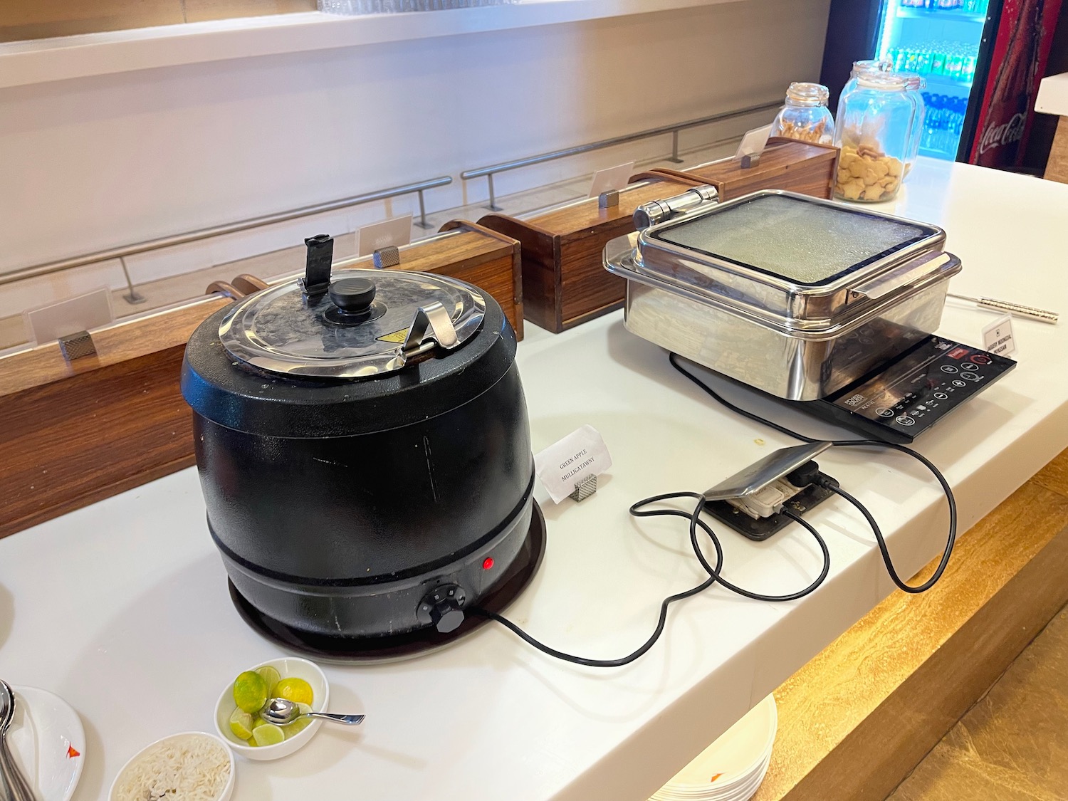 a black pot on a counter