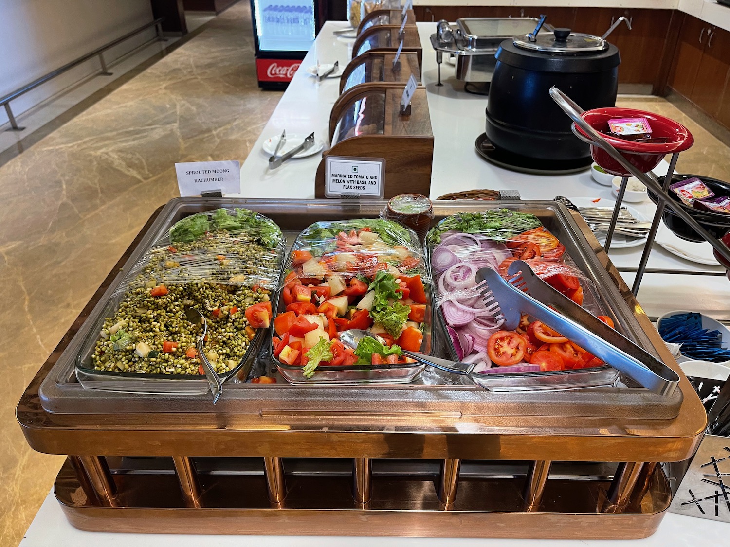 a tray of food in a buffet