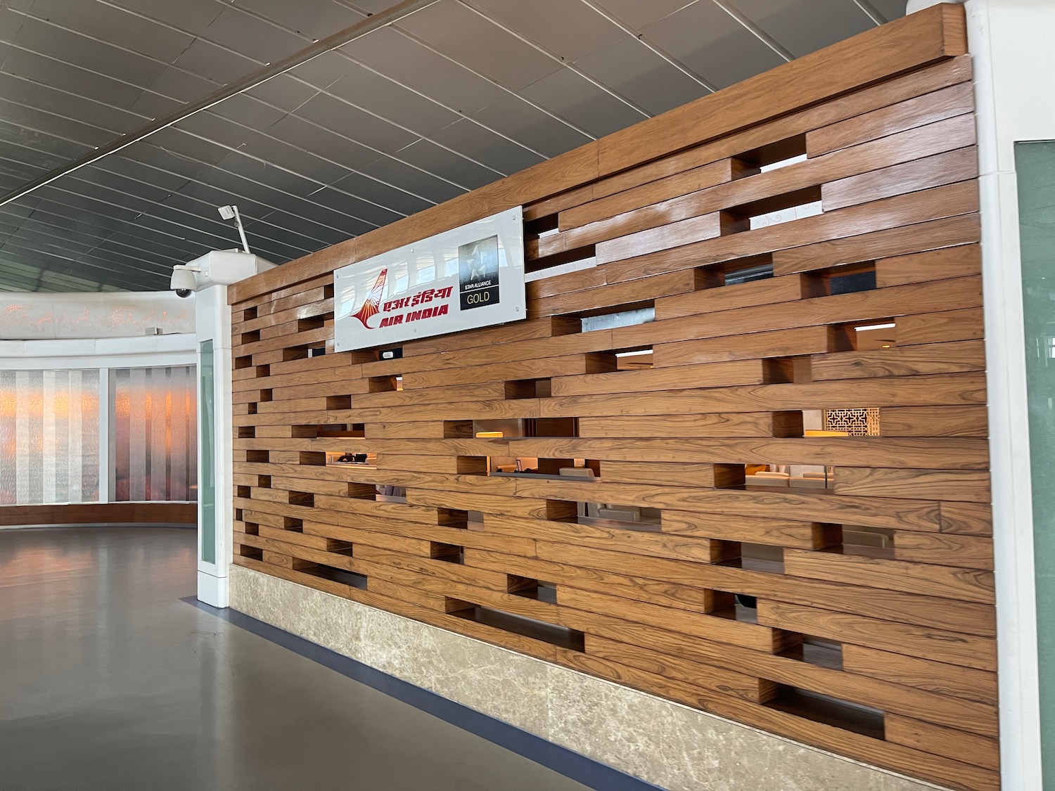 a wood wall with holes in it