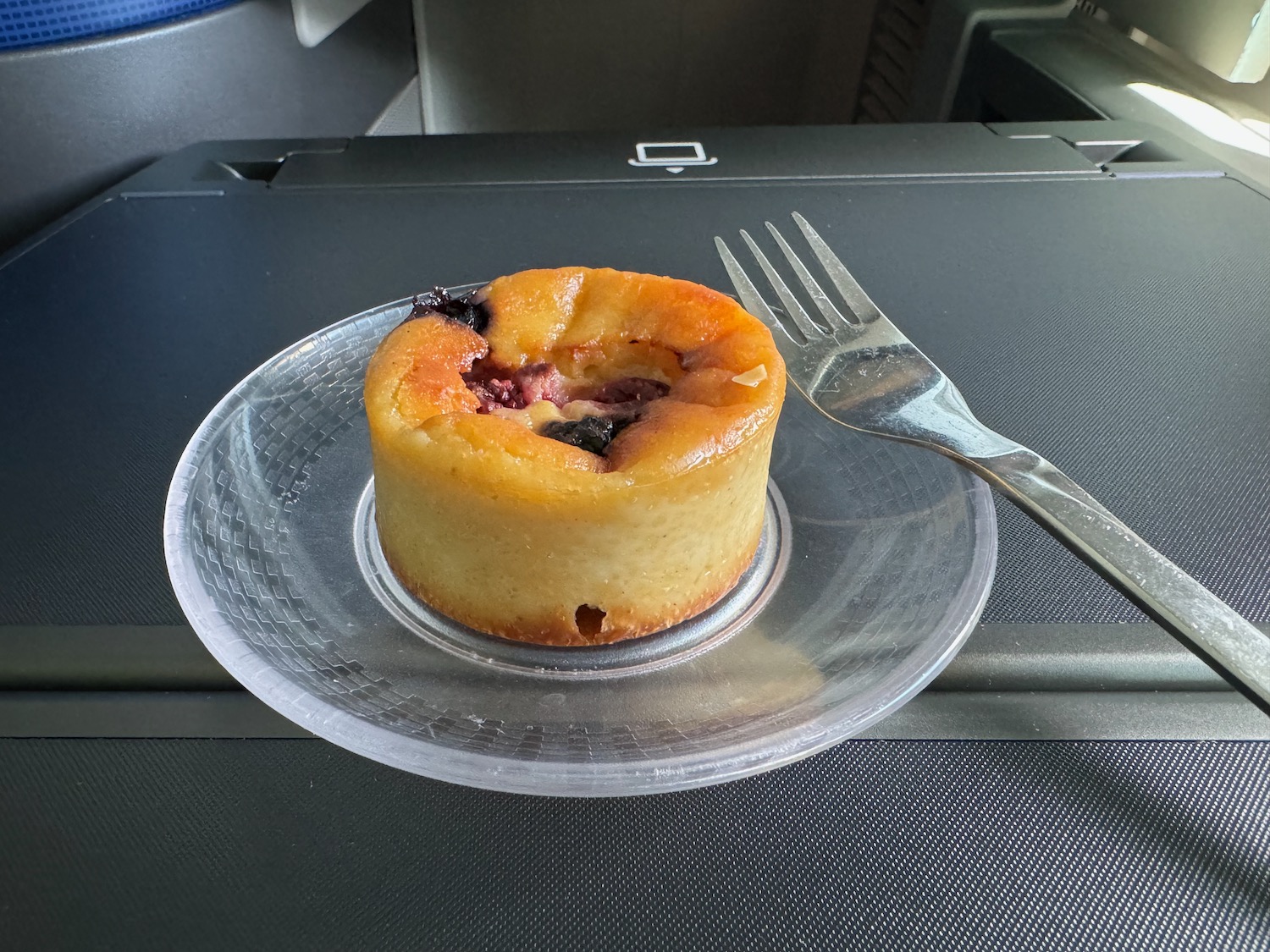 a pastry on a plate with a fork