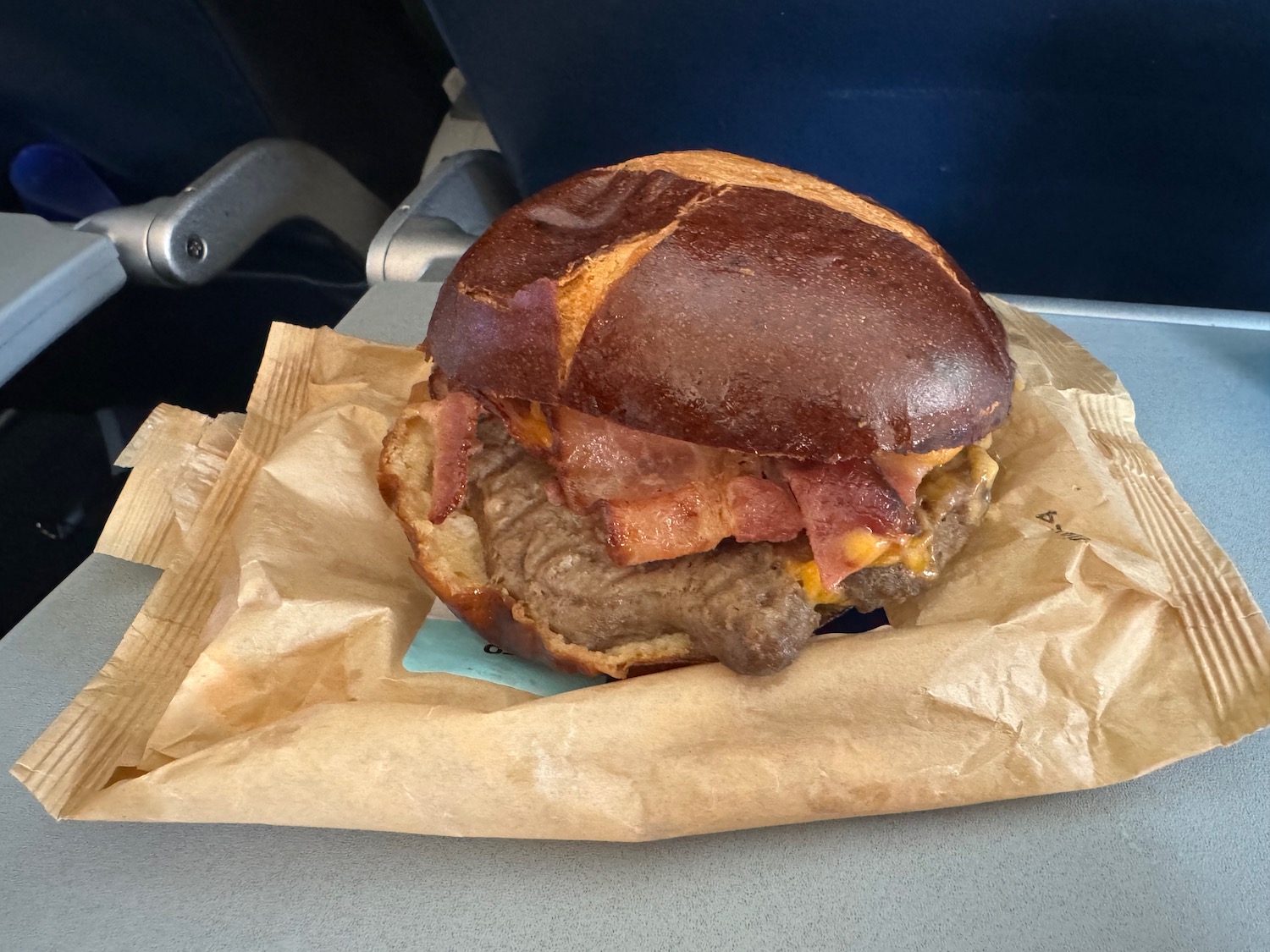 a burger on a paper wrapper