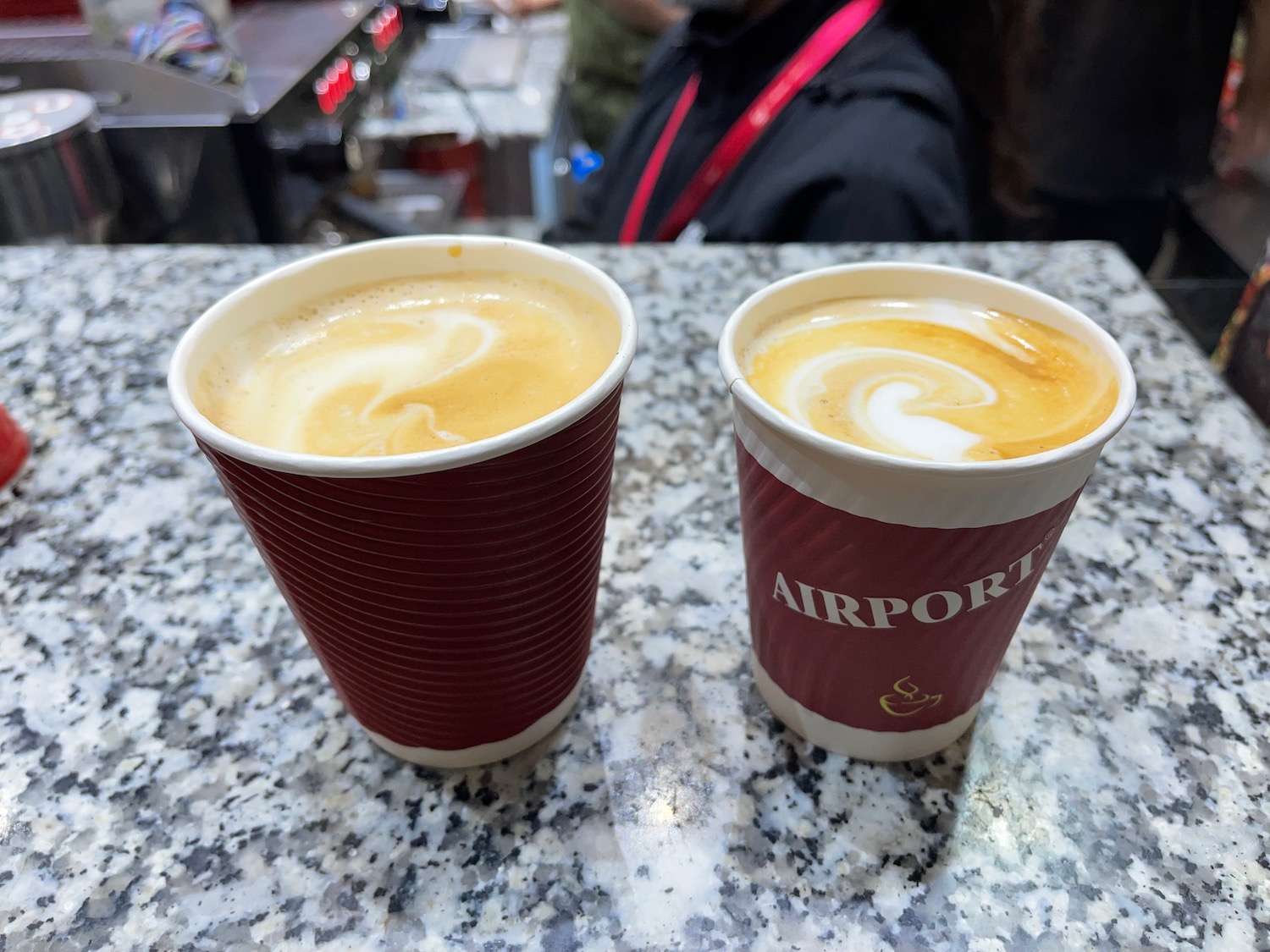 two cups of coffee on a counter