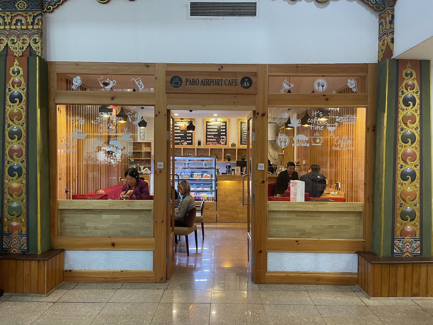 a restaurant with glass doors