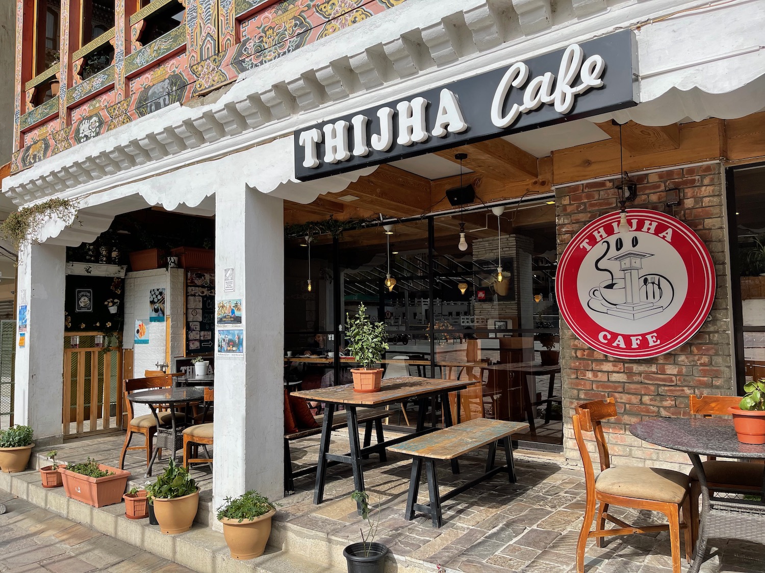 a restaurant with tables and chairs