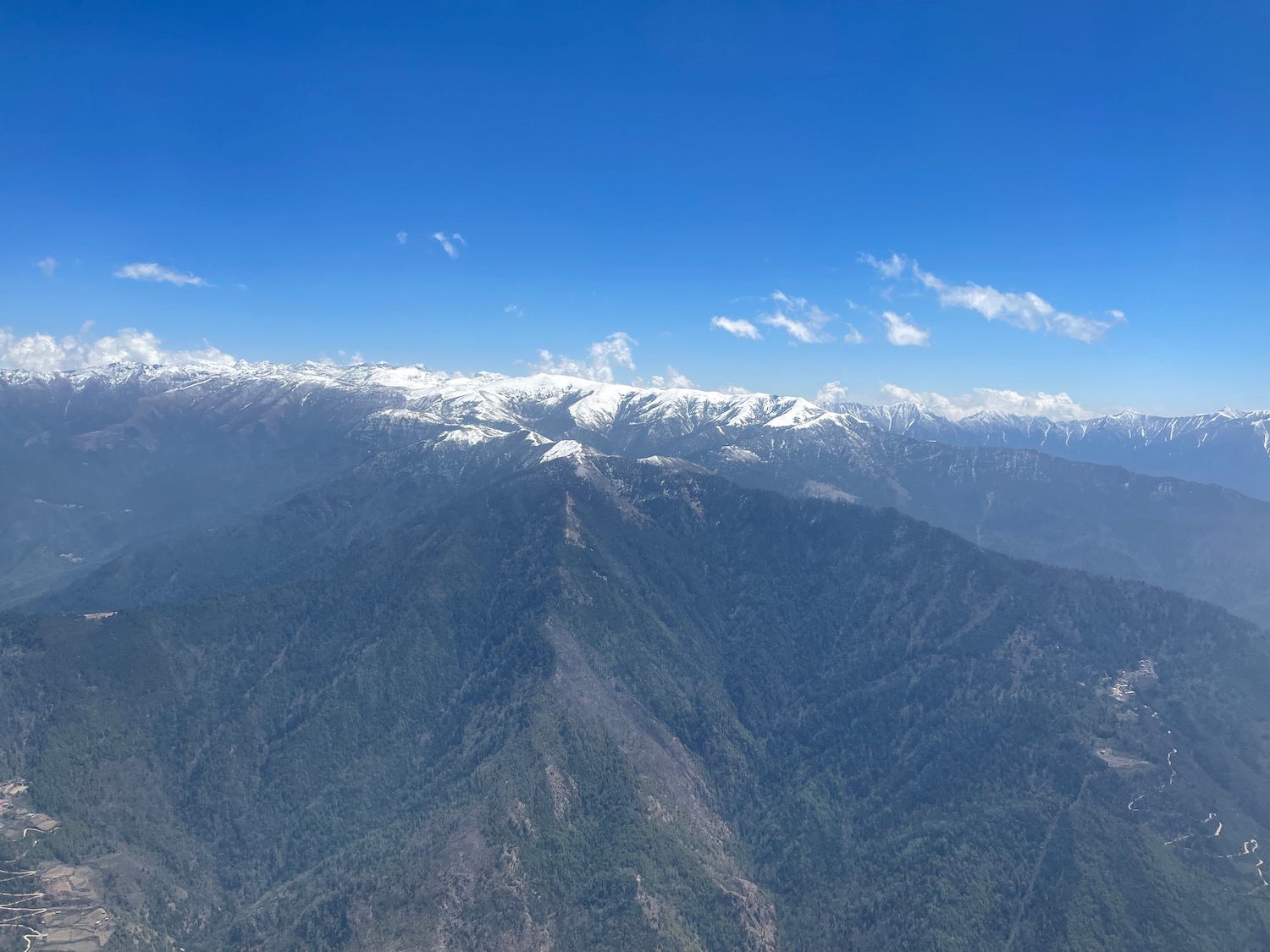 a mountain range with snow on top