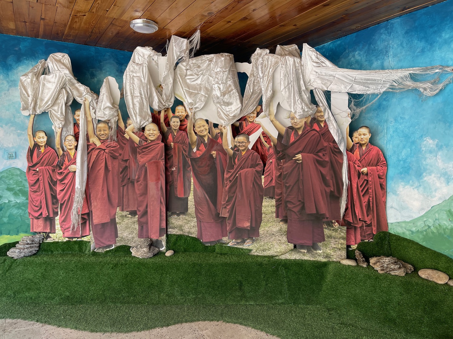 a group of people in red robes