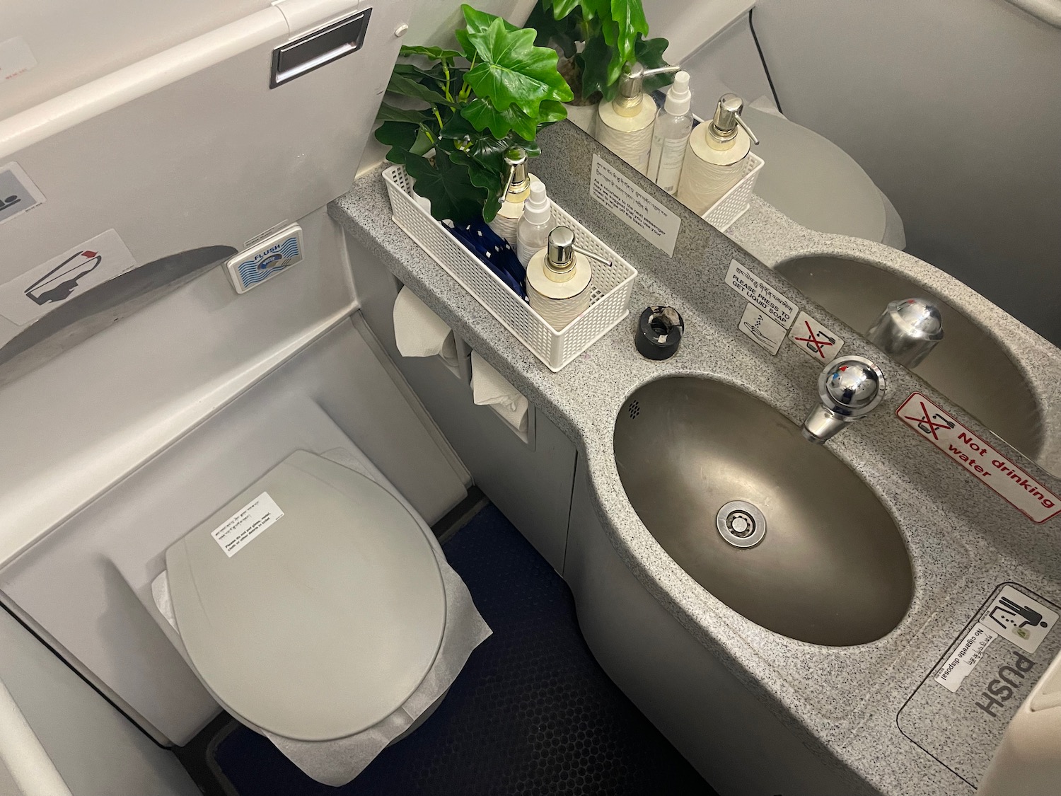 a sink and toilet in a plane