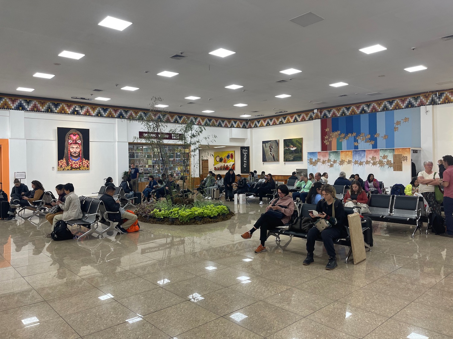 a group of people sitting in a large room