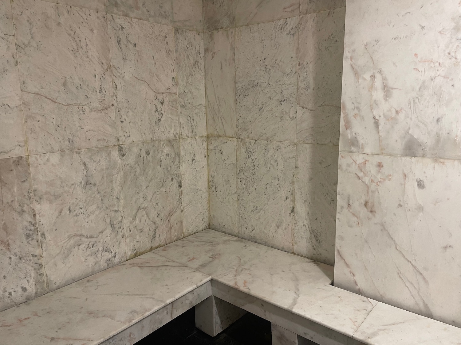 a corner of a marble room