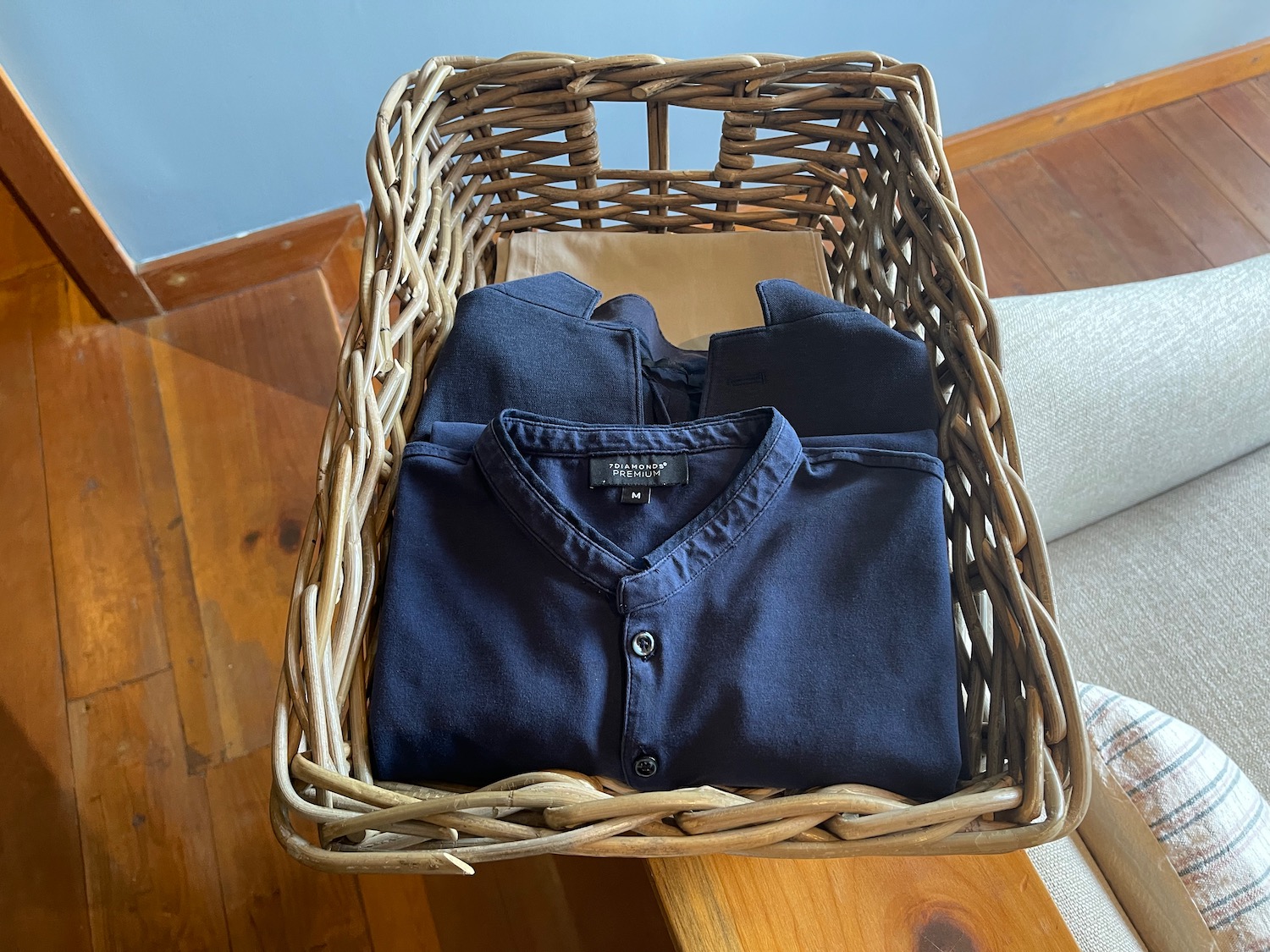 a basket of clothes on a table