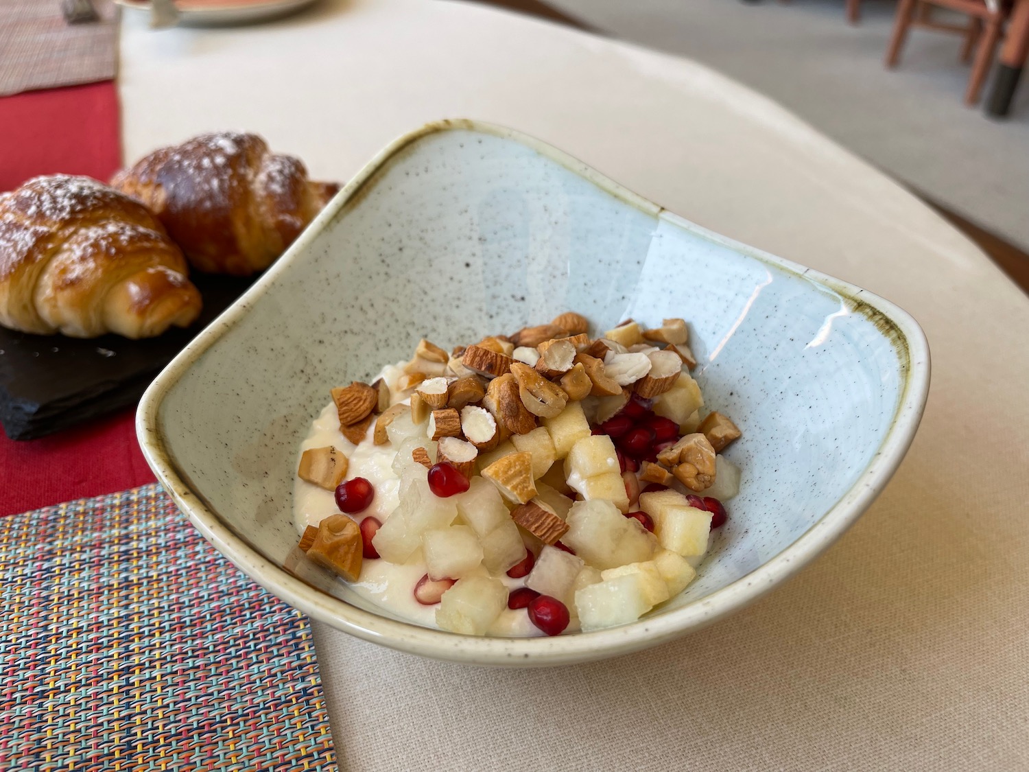 a bowl of fruit and nuts