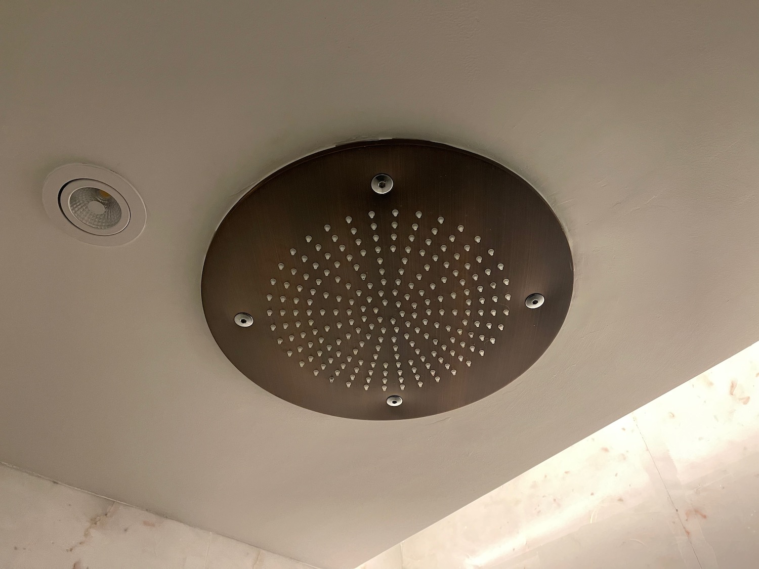 a shower head on a ceiling