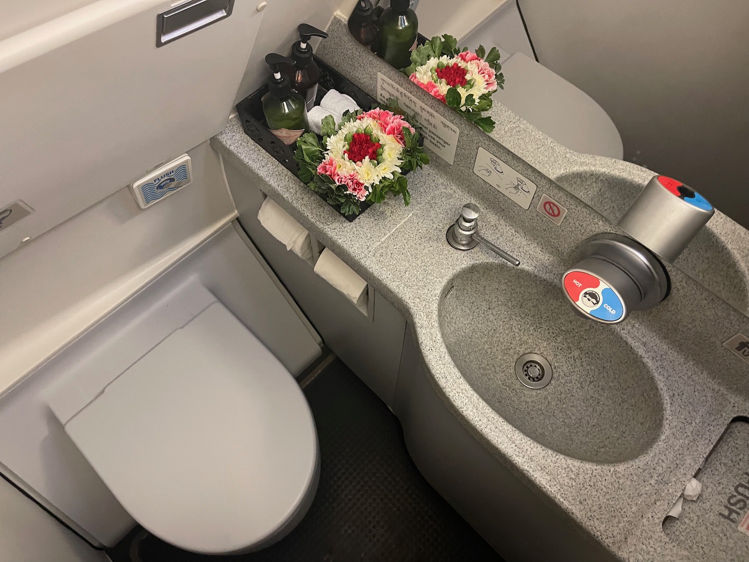 a sink and toilet in a plane