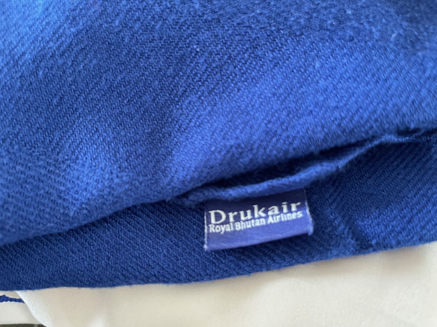 a blue fabric with a label