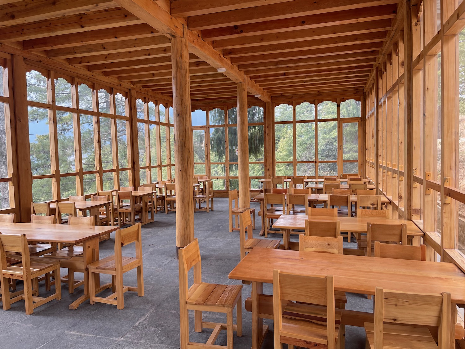 a room with tables and chairs