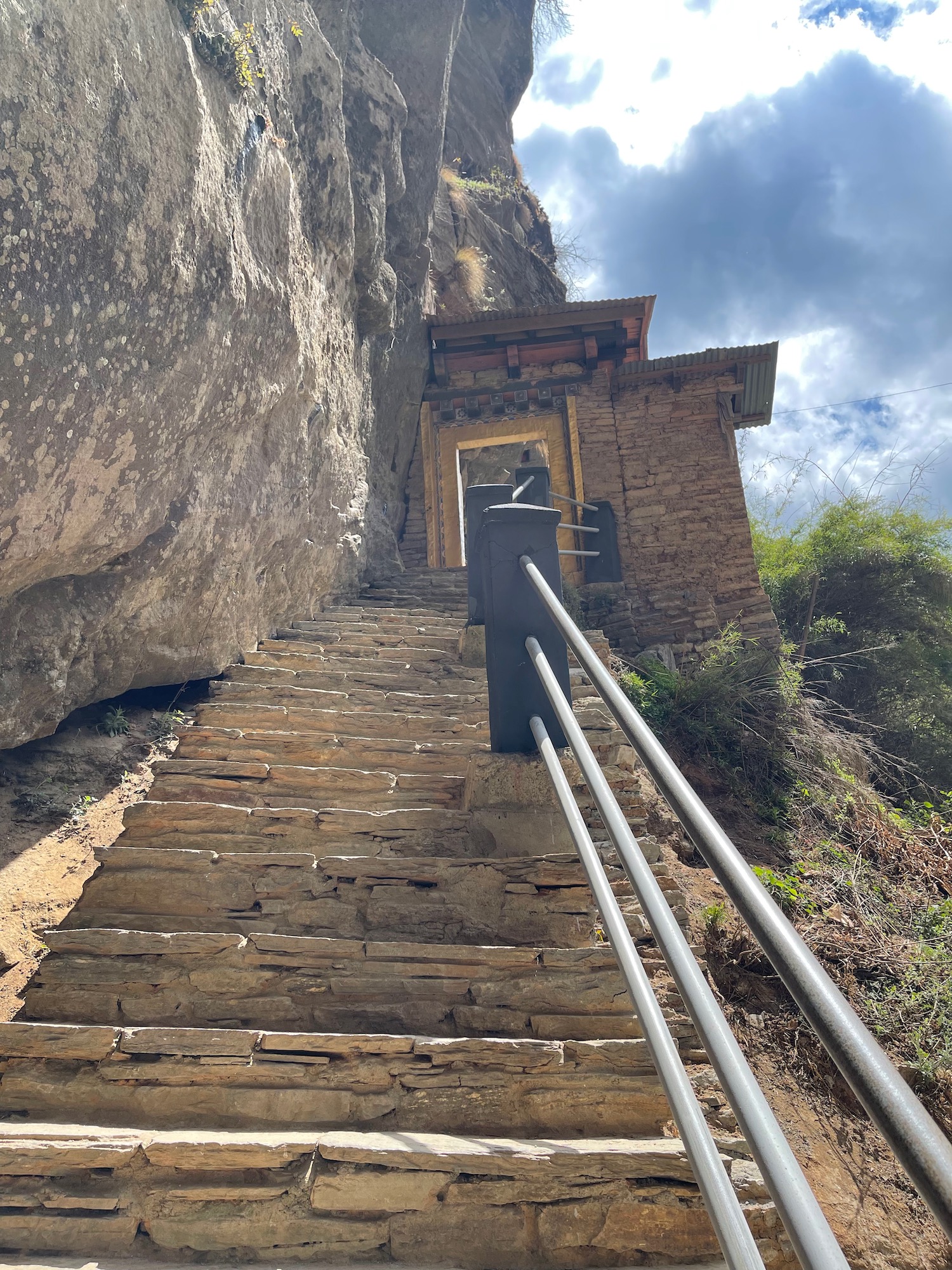 a stone stairs leading up to a building