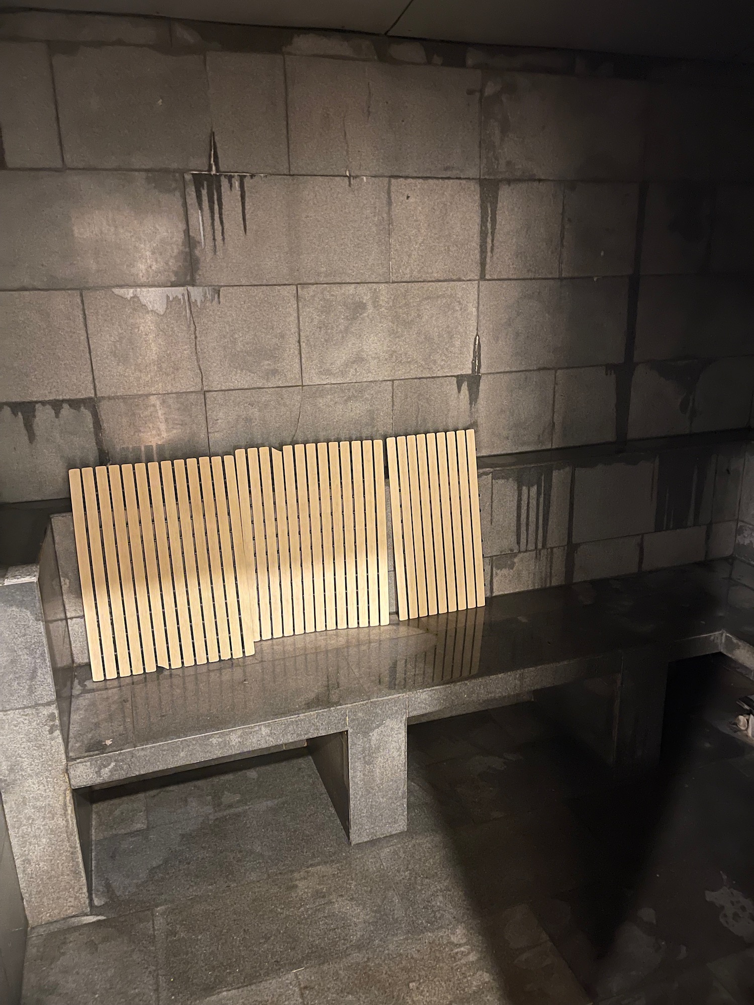 a bench with wood slats on it