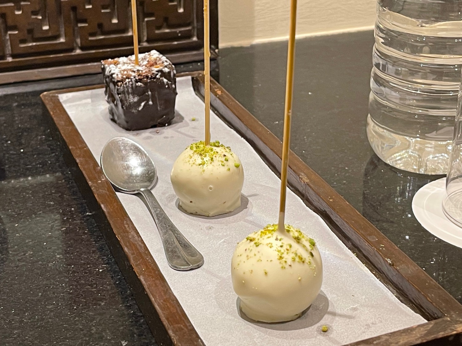 a tray of desserts on a table