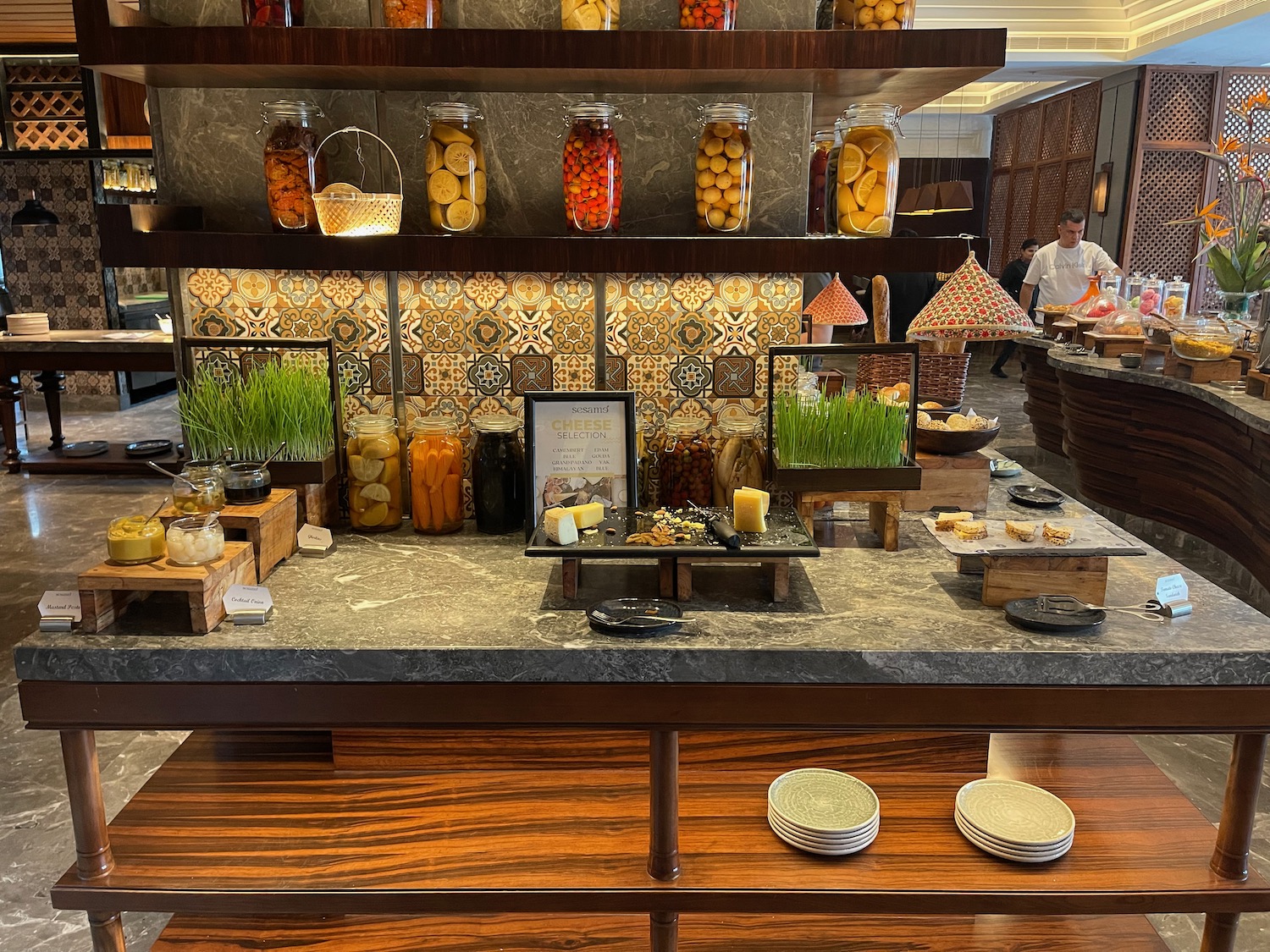 a buffet table with food on shelves