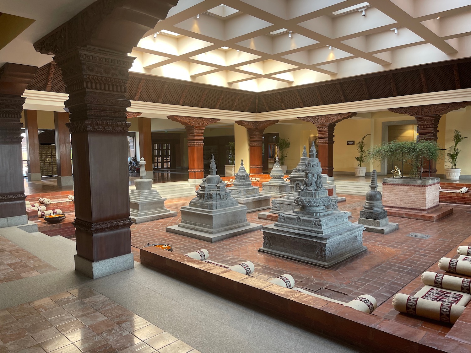 a large room with many statues