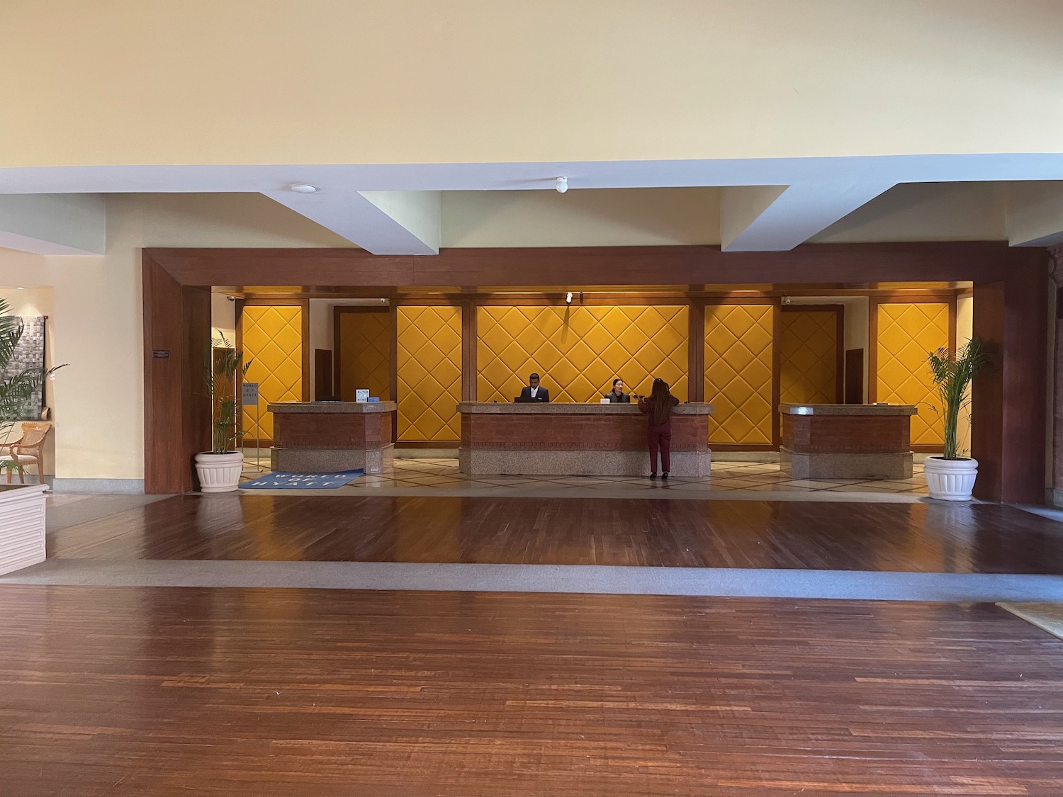 a reception desk in a hotel