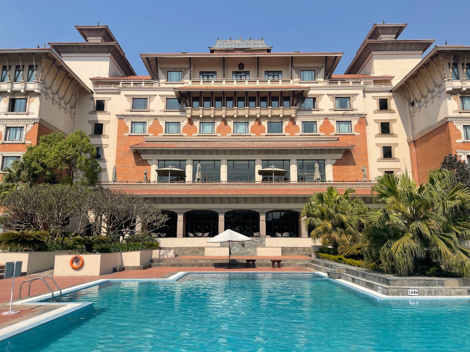 a pool in front of a building