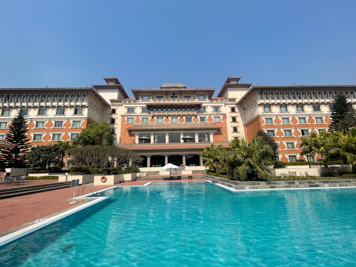 a pool in front of a building