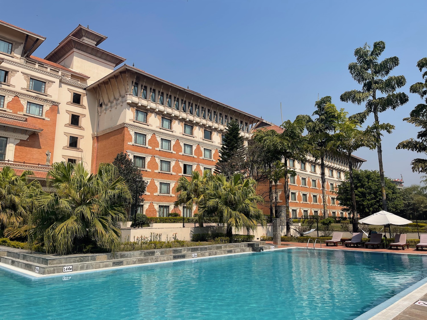 a pool in front of a building