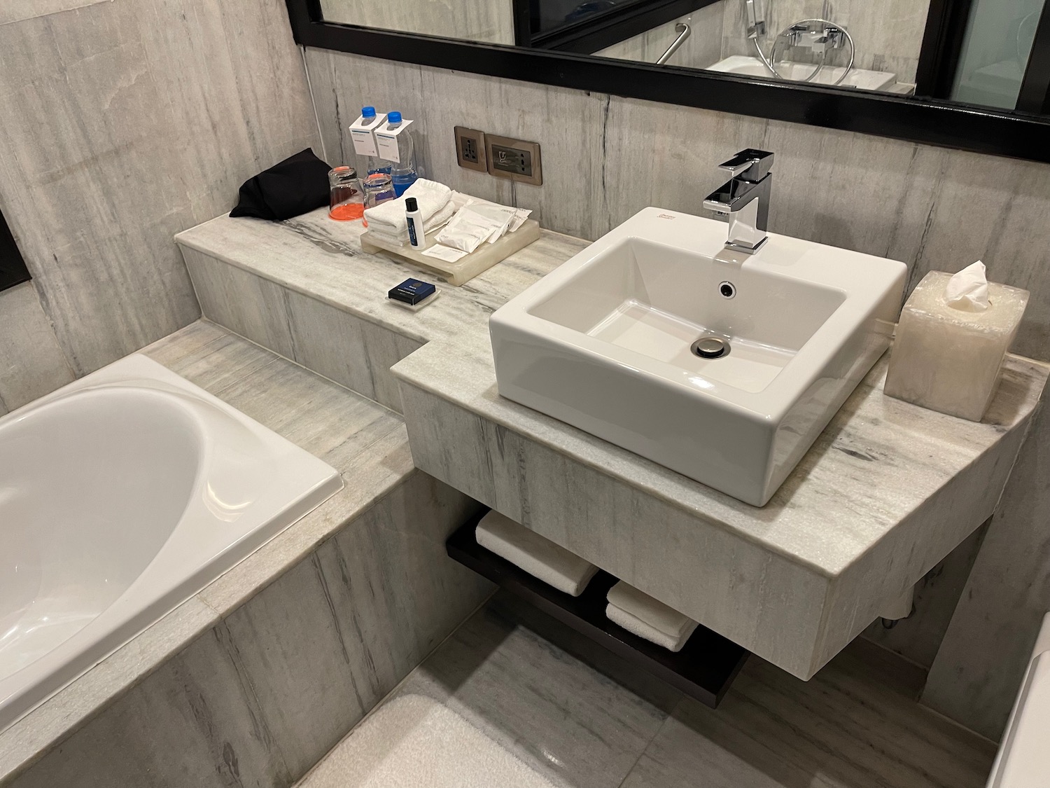 a bathroom with a sink and a bathtub