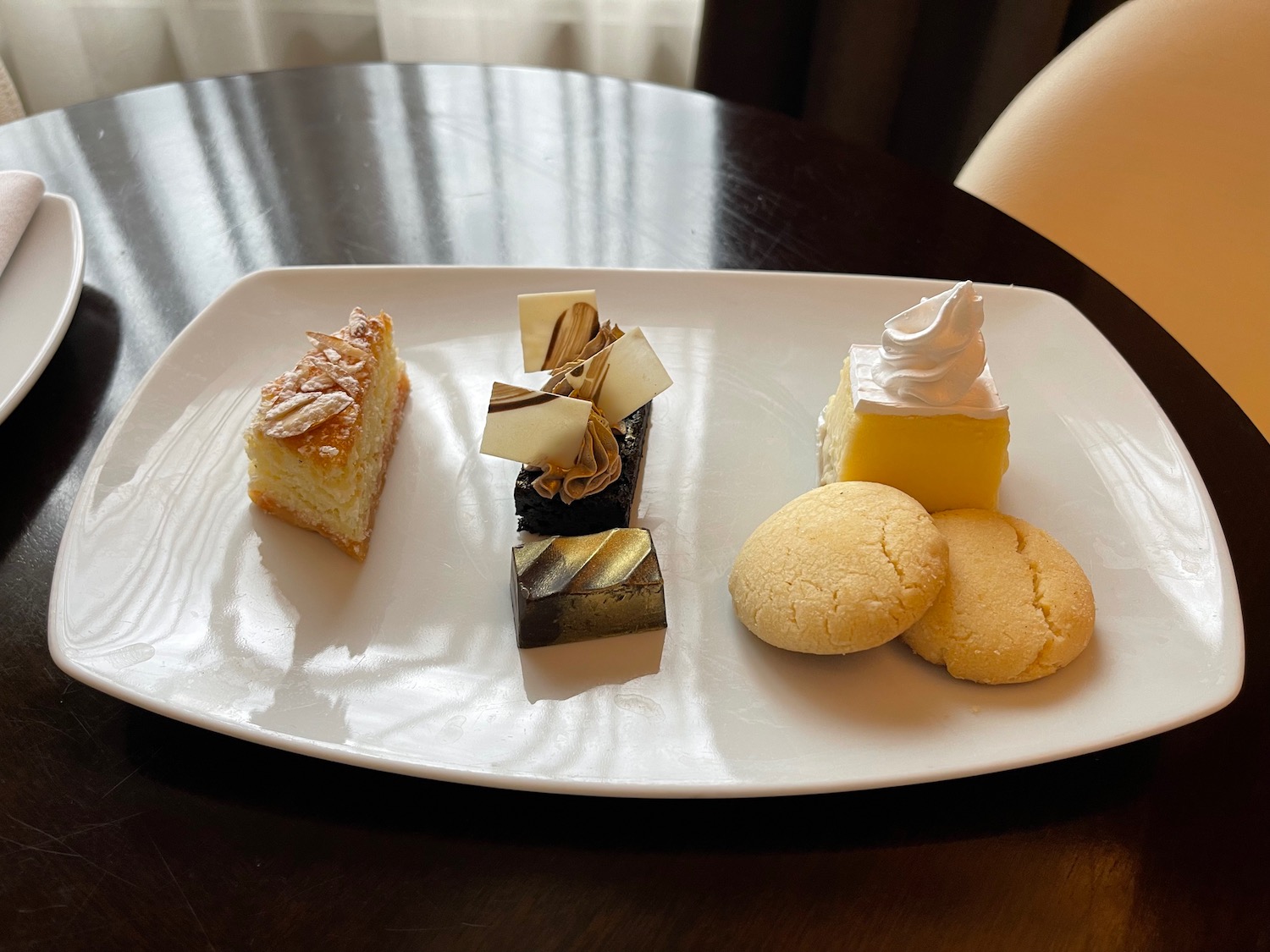 a plate of desserts on a table