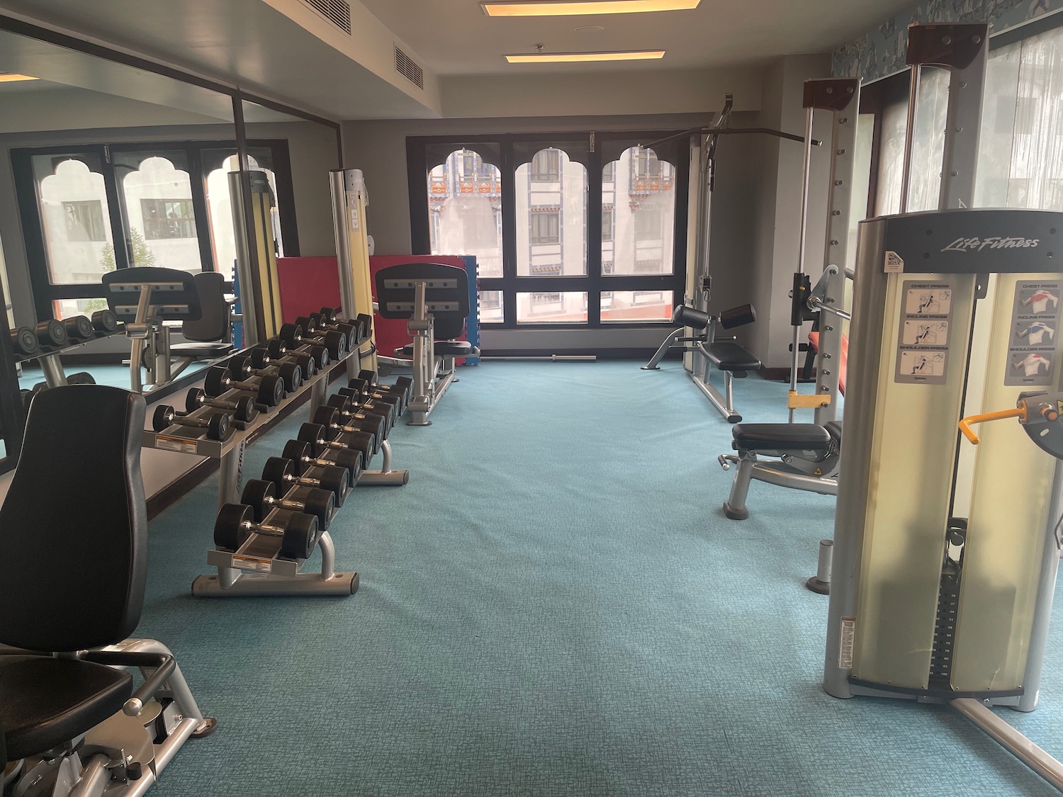 a gym with weights and exercise equipment