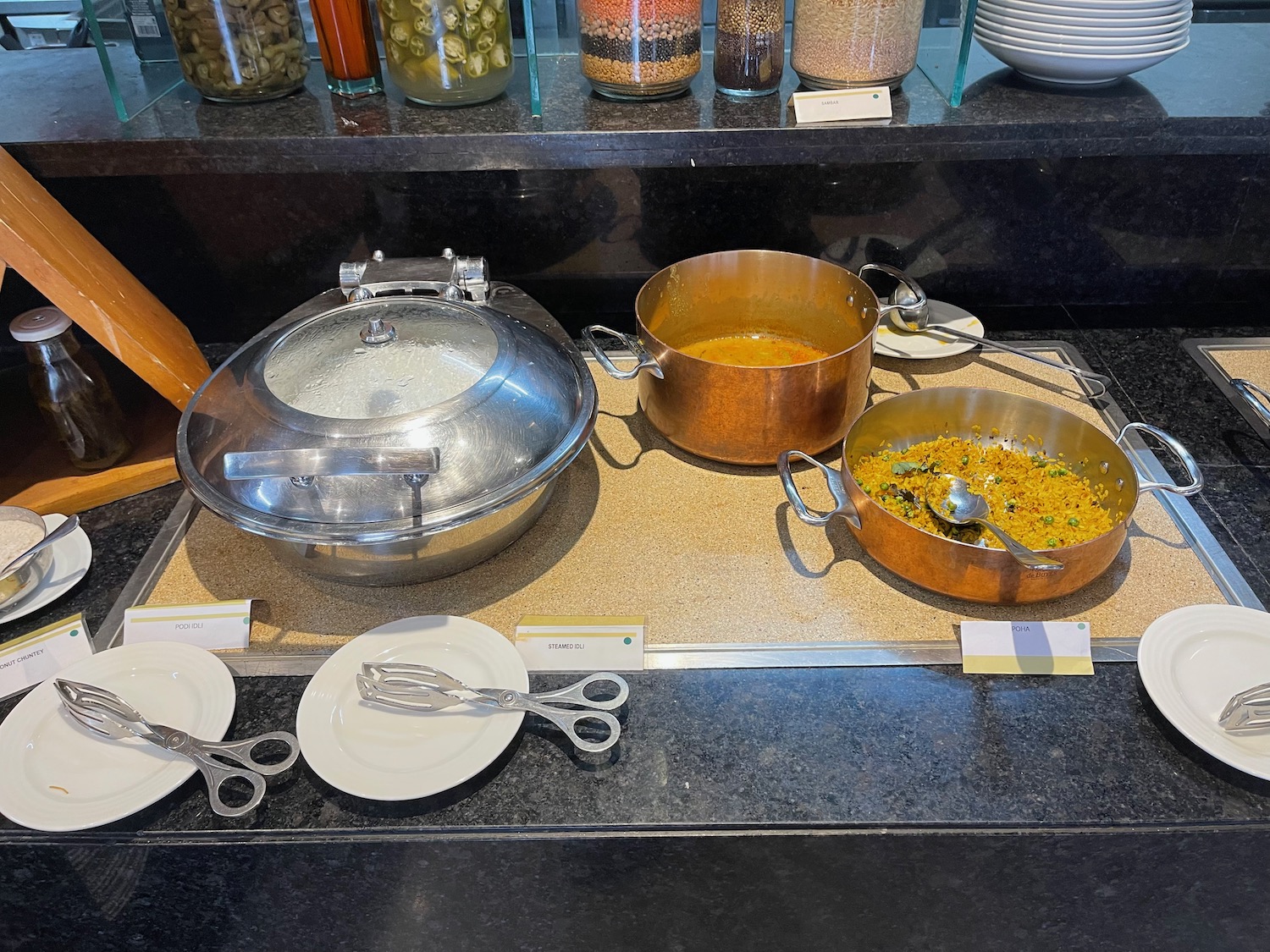 a group of pots and pans on a counter