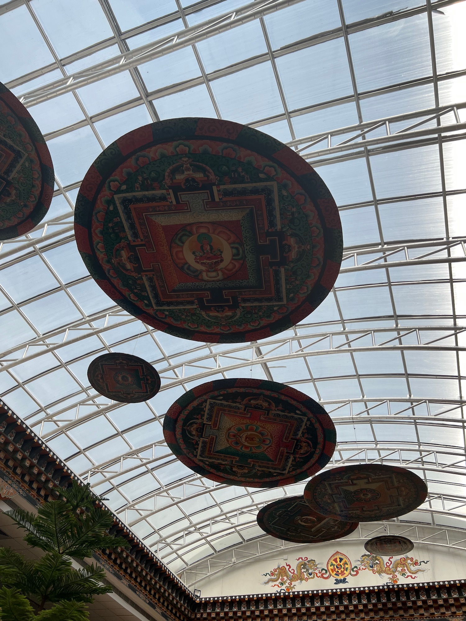 a group of circular objects from a ceiling