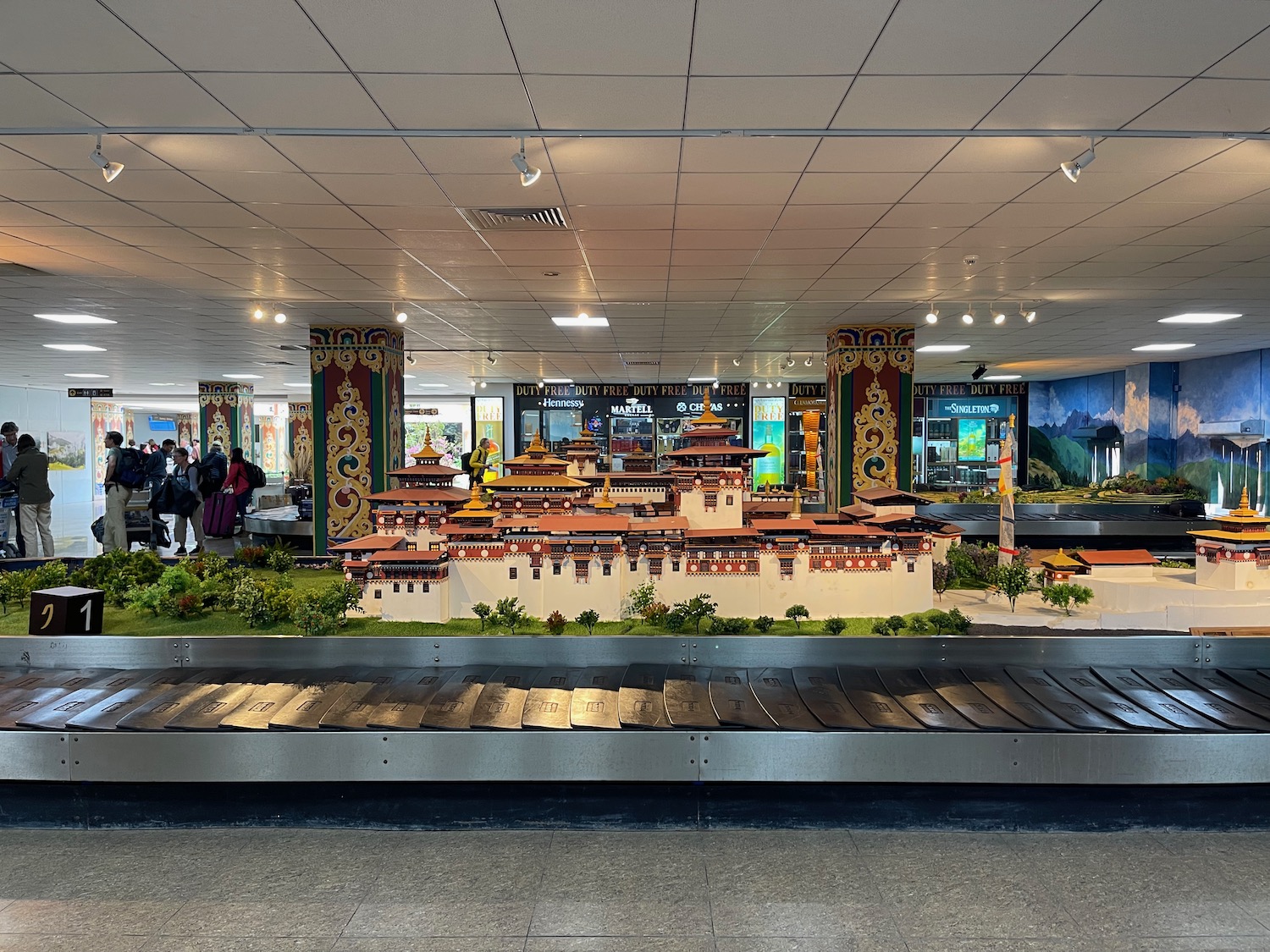 a model of a castle on a conveyor belt