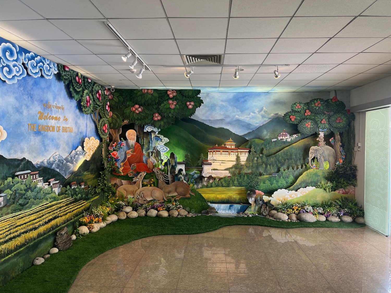 a mural of a garden with a man and animals