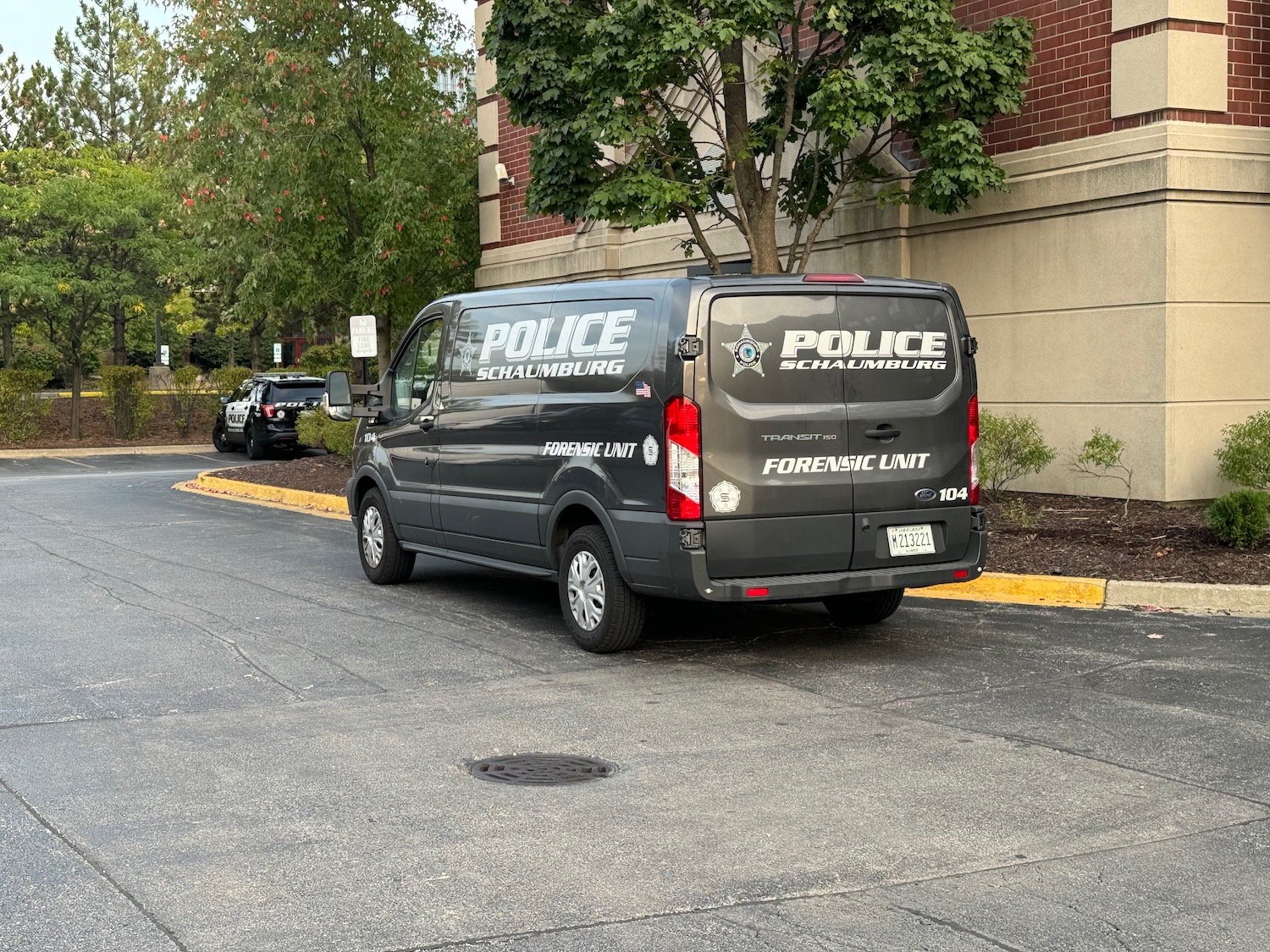 a black van parked on the side of a road