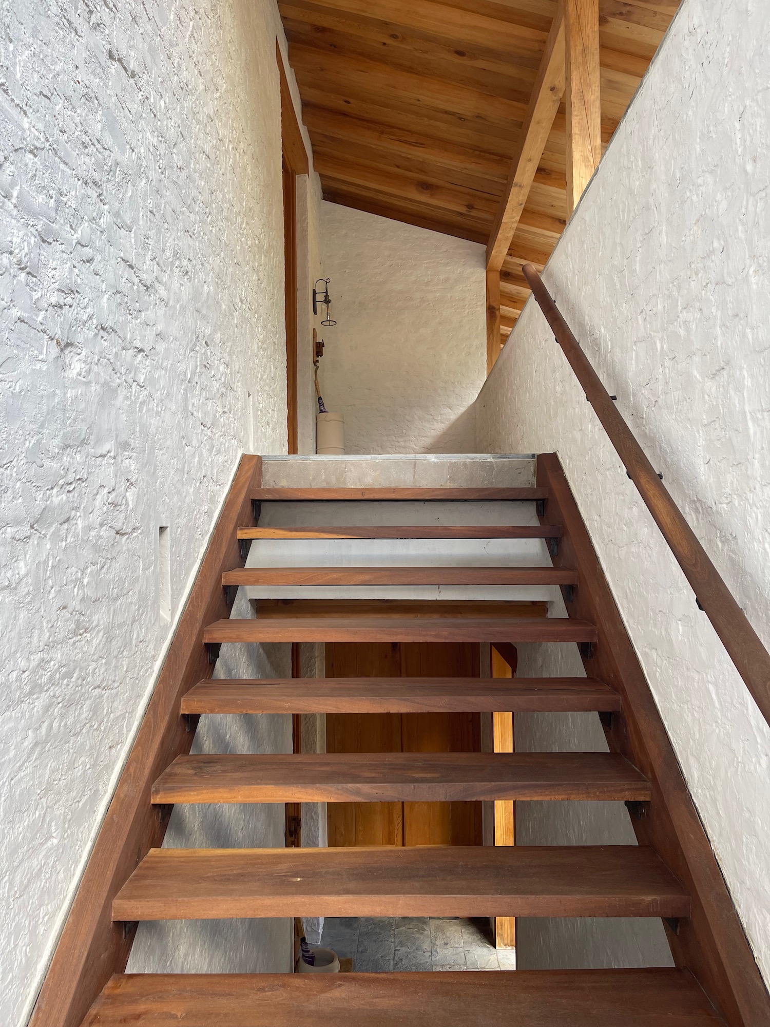 a wooden stairs in a house