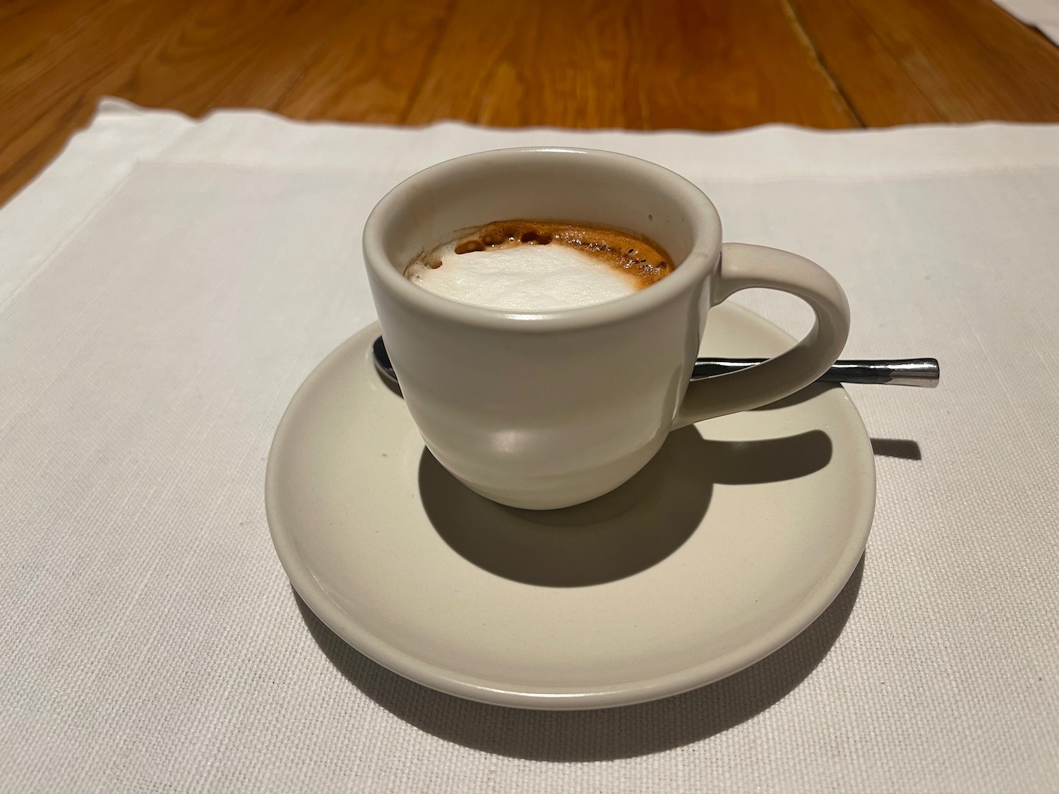 a cup of coffee on a saucer