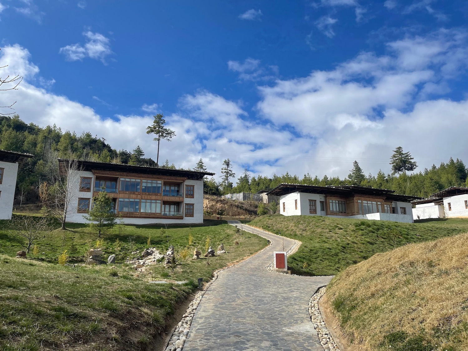 a stone path leading to a building