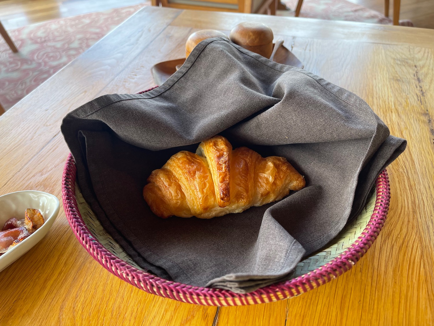 a croissant in a basket