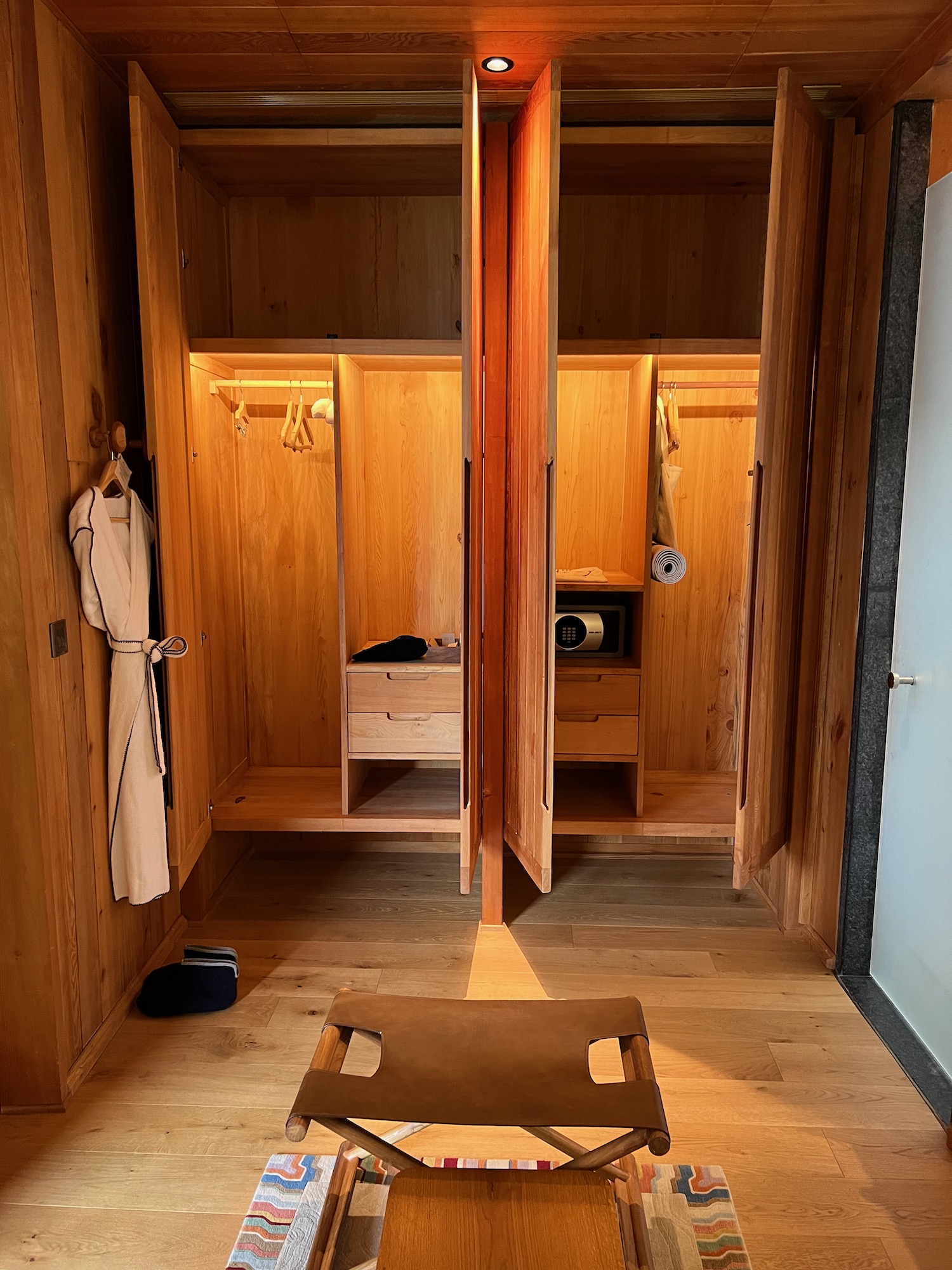 a closet with a door open