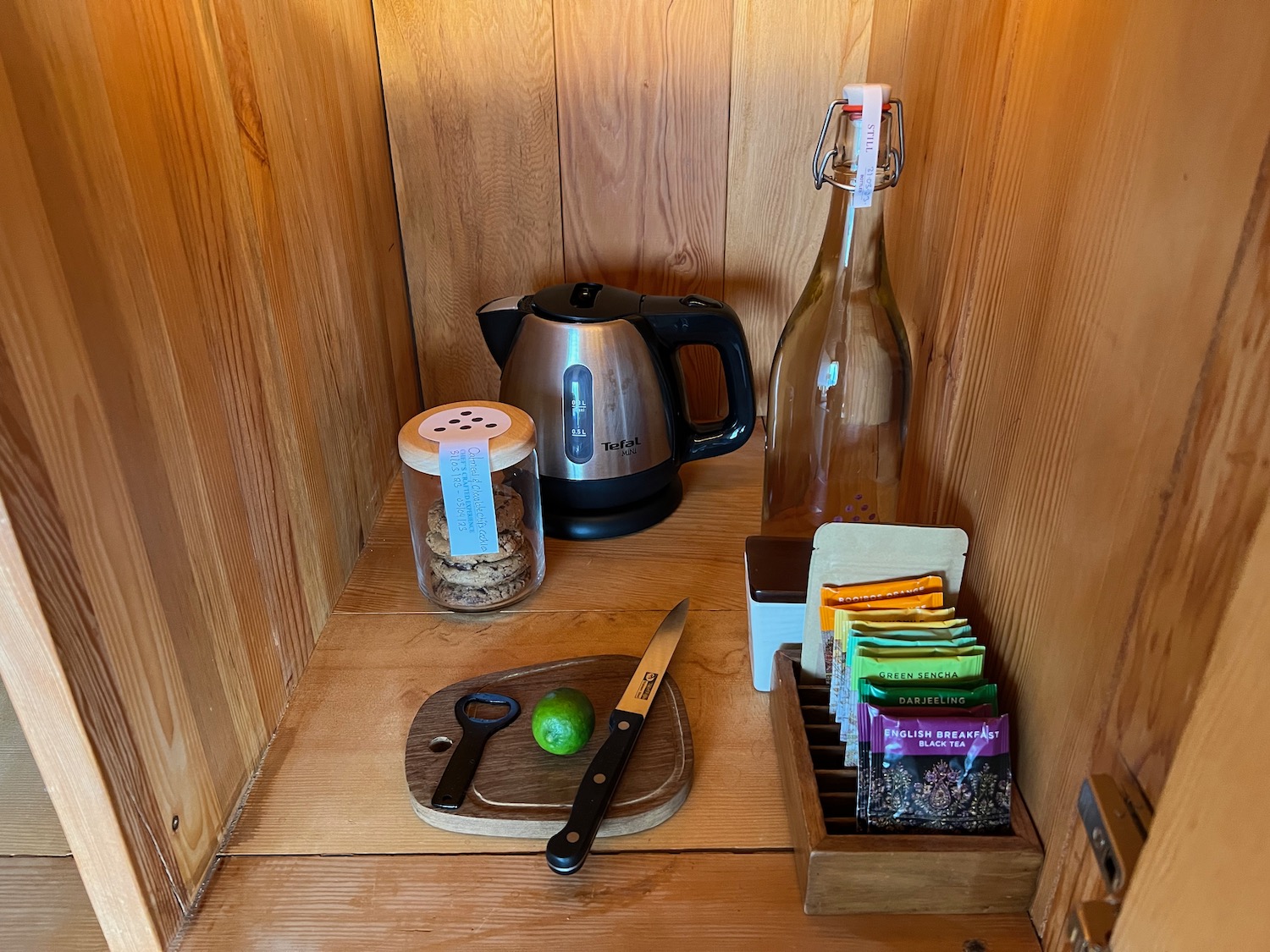 a kitchen utensils and a knife on a wooden surface