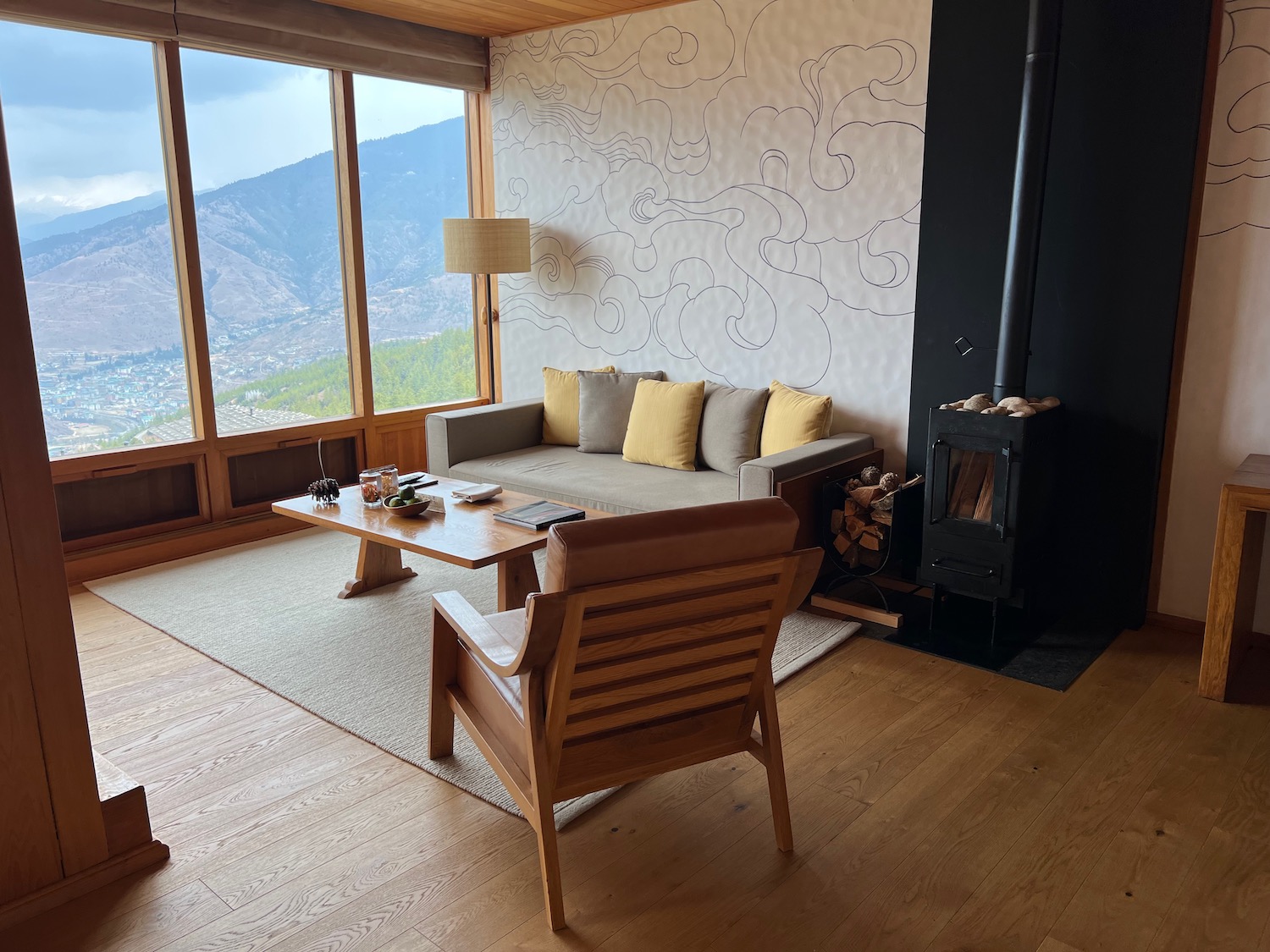 a living room with a couch and a fireplace